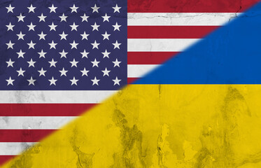 Digital composite image of flag of america and ukraine painted on wall, copy space