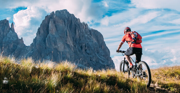 Mountain biking in the Dolomites Italy. Mountain bike, electric bike in the mountains on the trail and bike paths