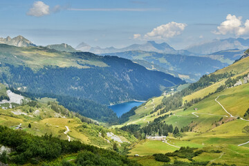 Fototapeta na wymiar Beautiful alpine summer landscape with Saint-Guerin lake in Savoie, France. Mountains travel background