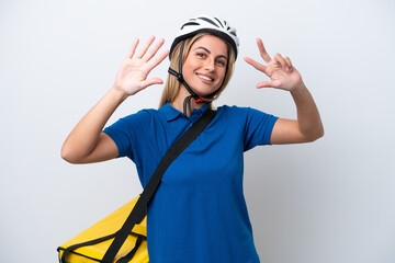 Young caucasian woman with thermal backpack isolated on white background counting eight with fingers