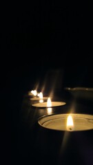 burning candle in the dark
