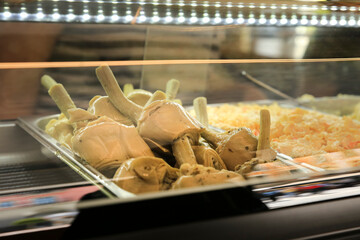 Artichokes in olive oil next to russian salad