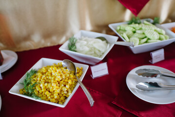 Variety of dishes on the buffet table in the hotel dining room