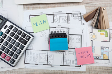 Architect work house sketch plan blue print with colors palette on desk