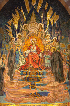 PARAY-LE-MONIAL, FRANCE - AUGUST 25, 2018: Chapel of St. Claude de la Colombiere (who was canonized by Pope John Paul II in 1992) built in 1929. Interior mosaics with sacred heart. God love concept.