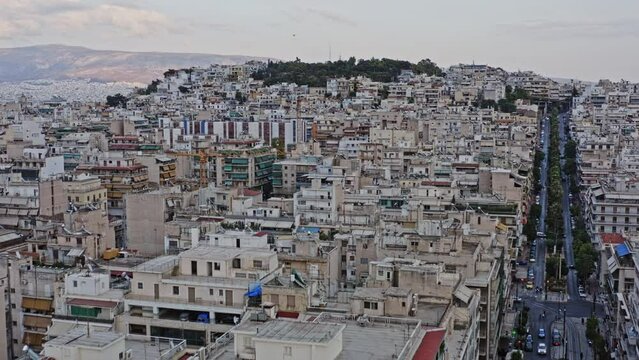 Pireas Greece Aerial v16 low level drone flying along leof. vasileos georgiou steep street leading to kastella hilltop, flyover reveals beautiful harbor view of saronic gulf - September 2021