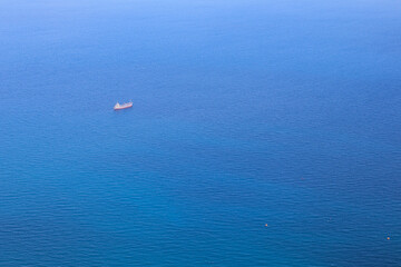 Fototapeta na wymiar Single ship in Mediterranean sea