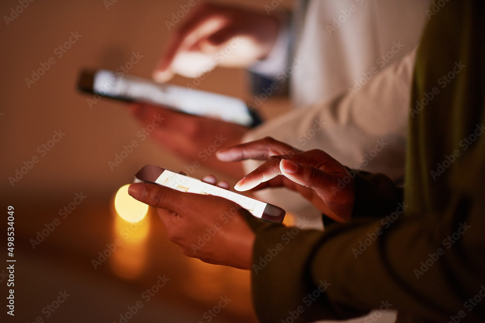 Poster Taking notes the easy way. Shot of an unrecognizable businesspeople using tablets in the office.