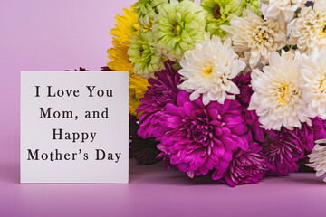 Text on note and concept of Mother's day greeting design with flower bouquet