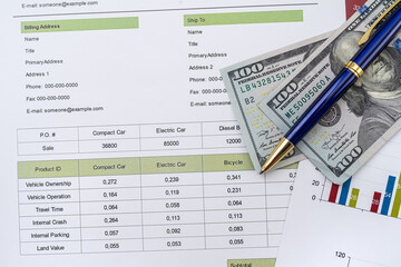 Paper chart diagram report with dollar bills. Business documents