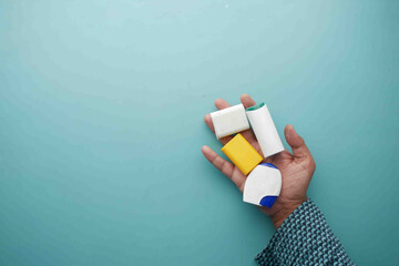 top view of holding many artificial sweetener container on table 