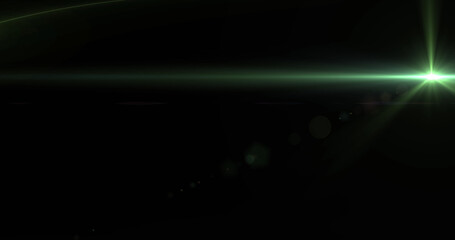 Image of green glowing light on black background