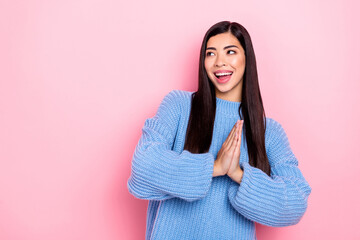 Portrait of attractive cheerful girl asking gift good mood copy space isolated over pink pastel...