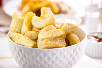 sweet and fried cassava bowl, typical south america and brazil snack, homemade food