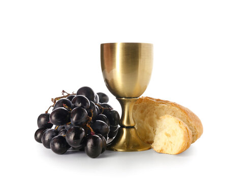 Cup of wine with grapes and bread on white background