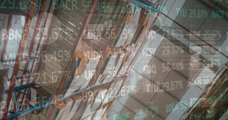 Image of financial data processing and stock market over empty warehouse