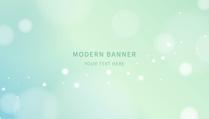 Blue and green gradient background with light spots.