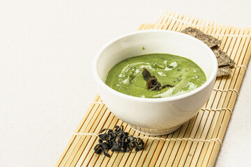 Kelp puree isolated on white background. Healthy superfood from oceanic seaweed