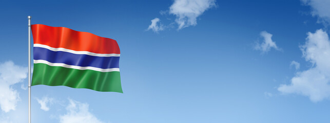 Gambian flag isolated on a blue sky. Horizontal banner