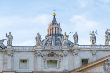 Fototapeta na wymiar Statues on Colonnade Surrounding St. Peter's Basilica, Vatican, Italy