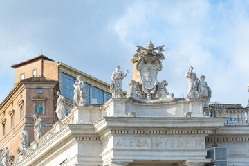 Fototapeta na wymiar Bernini's Saints Statues at top of St. Peter's Square Colonnade, Vatican, Italy