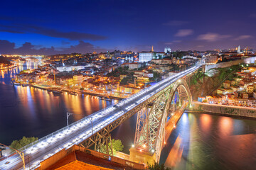 Fototapeta na wymiar Porto, Portugal cityscape over the Douro River and Dom Louis Bridge
