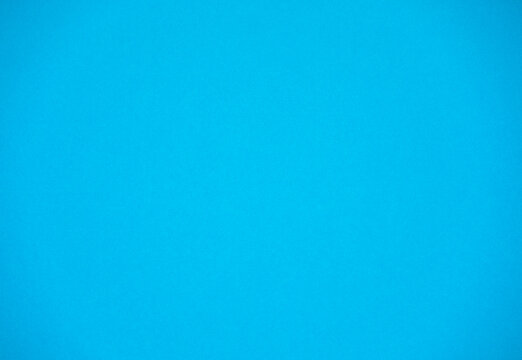 This is for minimal object background. A few mottled bright turquoise blue green paper solid plain