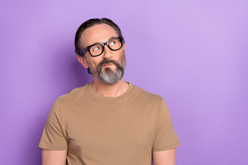 Photo of mature skilled thoughtful minded businessman can't decide brainstorming isolated on purple...