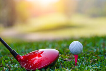 Golf balls on the golf course with golf clubs ready for golf in the first short. In the morning,...