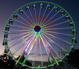 colourful lights and colours of a Ferris wheel at Sydney Easter Show NSW Australia