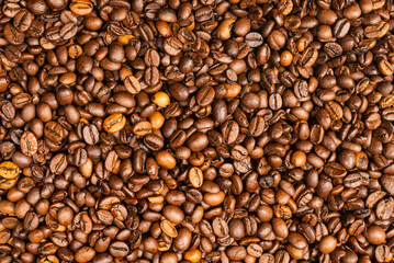 Coffee beans on a white background. Top view.