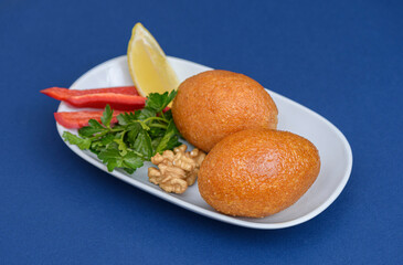 Stuffed meatballs, a traditional Turkish delicacy. Kibbeh is a popular dish in Middle Eastern cuisine (Turkish name; icli kofte)
