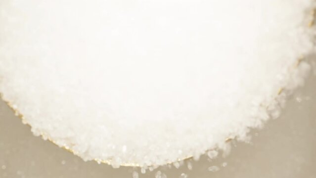 I take out a spoon from a jar of sugar, top view. Slider Dolly close-up. Laowa Probe