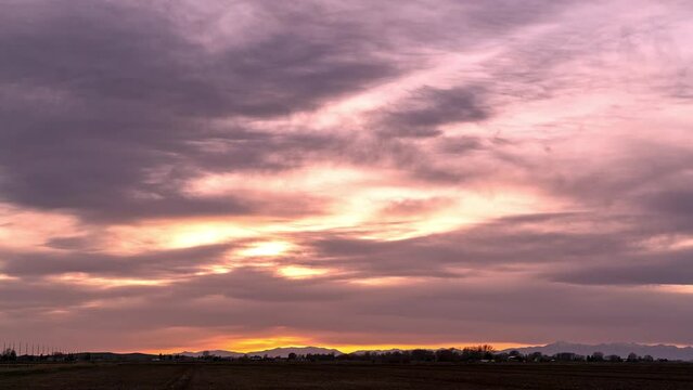 Timelapse of sunset in Eastern Idaho in the Spring as clouds move through the sky.