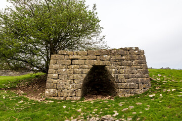 A limestone kiln on a hillside in Cumbria