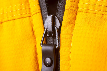 Close-up of a zipper on a jacket.