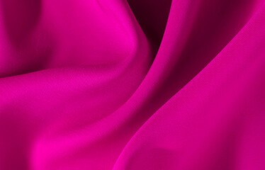 Red fabric background with oxen. Wrinkled burgundy fabric. Textile. Clothing material