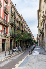 A view down a side street of the Rambles in Barcelona on a spring day