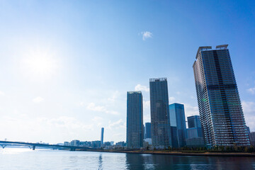 Tower apartments lined up along the river and a refreshing blue sky_44