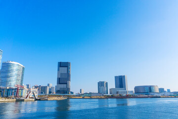 Tower apartments lined up along the river and a refreshing blue sky_48
