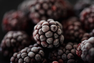 Close up of frosty frozen blackberries.