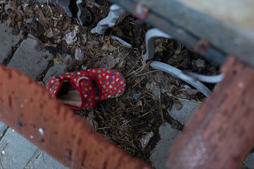 Kids shoes on representing civilian casualties in an active war zone