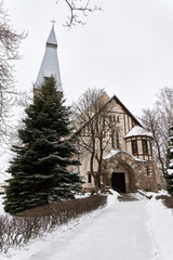 Fototapeta na wymiar The Church of the Holy cross at winter in Riga, Latvia