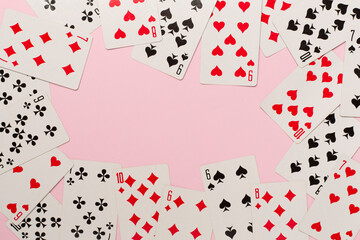 Playing cards on color background. Gambling concept. Top view