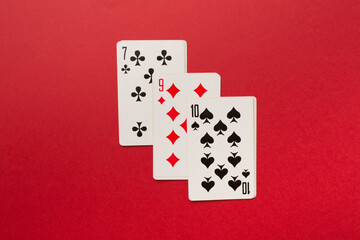 Playing cards on color background. Gambling concept. Top view