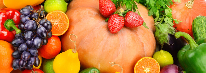 Background from various vegetables and fruits. Wide photo.