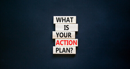 Action plan symbol. Concept words What is your action plan on wooden blocks. Beautiful black table...