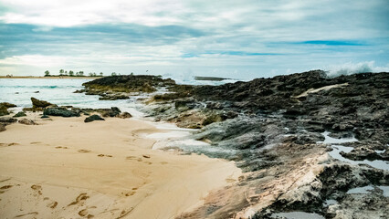 Fototapeta na wymiar shoreline beaches island blue tan