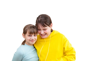 Two sisters hugging and having fun in studio on white background. age difference