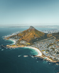 Naklejka premium Aerial shot of the coast of Cape Town, South Africa and Signal Hill